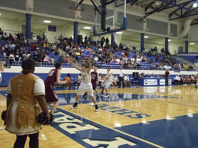 Image: Campbell’s an obstacle — Gladiator Colton Campbell(5) defends Mildred’s inbound attempt.