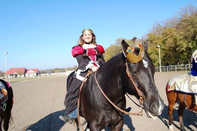 Image: Royalty — Allyssa Ballew of Midlothian won the Most Royal costume as the Burger King and Queen (the horse’s name really is King).
