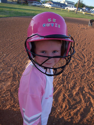 Image: A cutie…? — Don’t let that pretty pink helmet and that manufactured smile throw you off, Hooker is rough and tough.