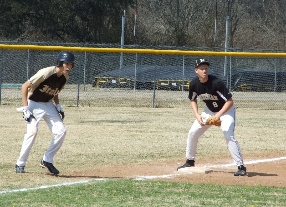 Image: DeMoss rounds the corner — Alex DeMoss (4) puts a score on the board in top of the 4th.