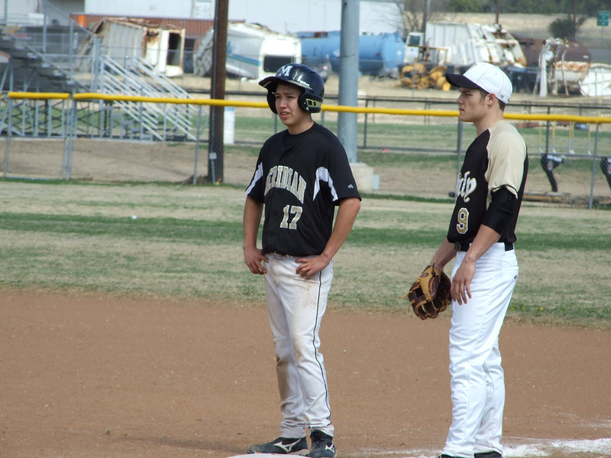 Image: Simon is secure — Ethan Simon (9) takes care of first base.