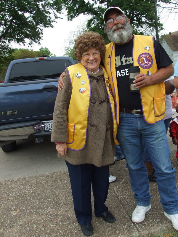 Image: Lions Club Members — Lions Club members helped to keep the children out of the street.