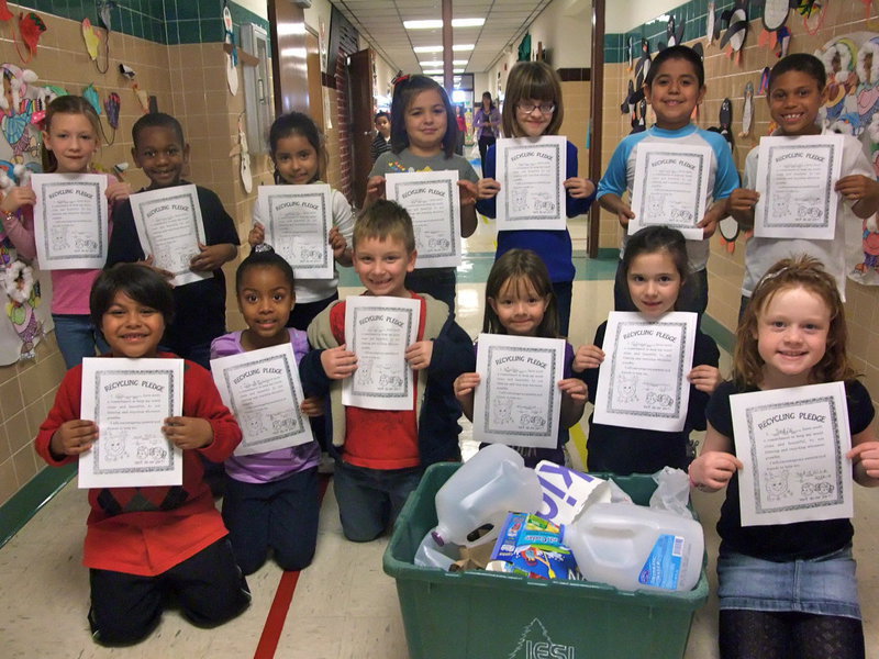 Image: Mrs. McCleskey’s first graders — These students love the recycling project.
