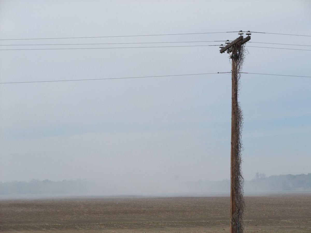 Image: 13 mph gusts — 13 mph gusts sent the billowing smoke toward Highway 77.