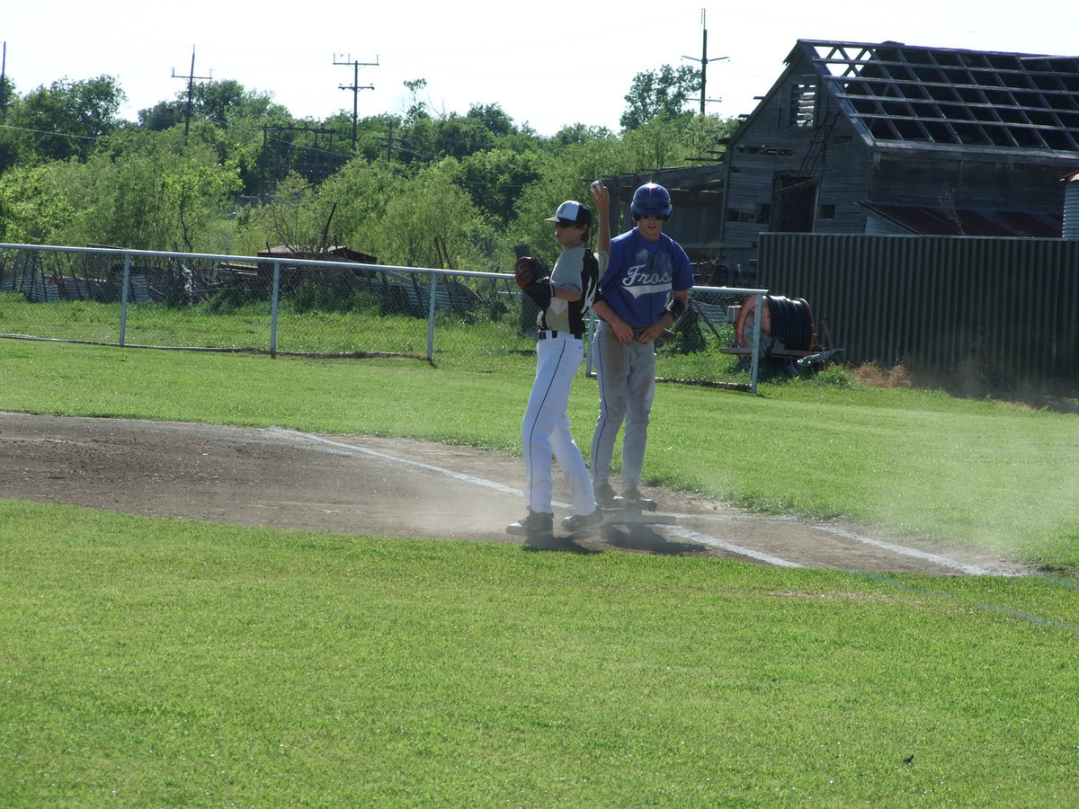 Image: Campbell is first baseman — Colten Campbell waited for Buchanan to send the Frost player to the dugout.