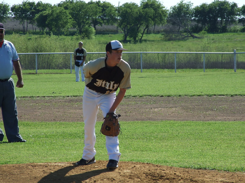 Image: Justin Buchanan   — Buck waits for his pitch from catcher, Ryan Ashcraft.