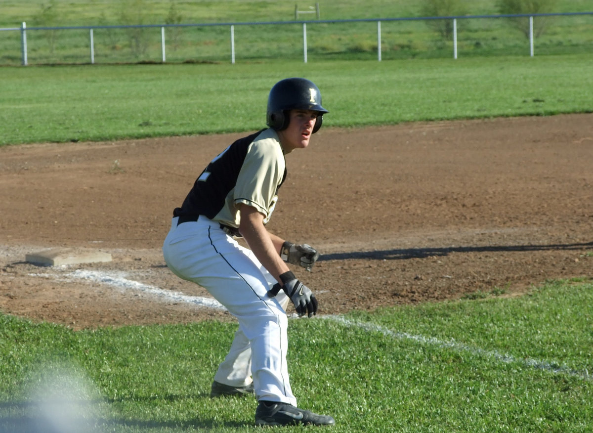 Image: Ashcraft is on third — Junior, Ryan Ashcraft rounded third base and waited for his chance to score.