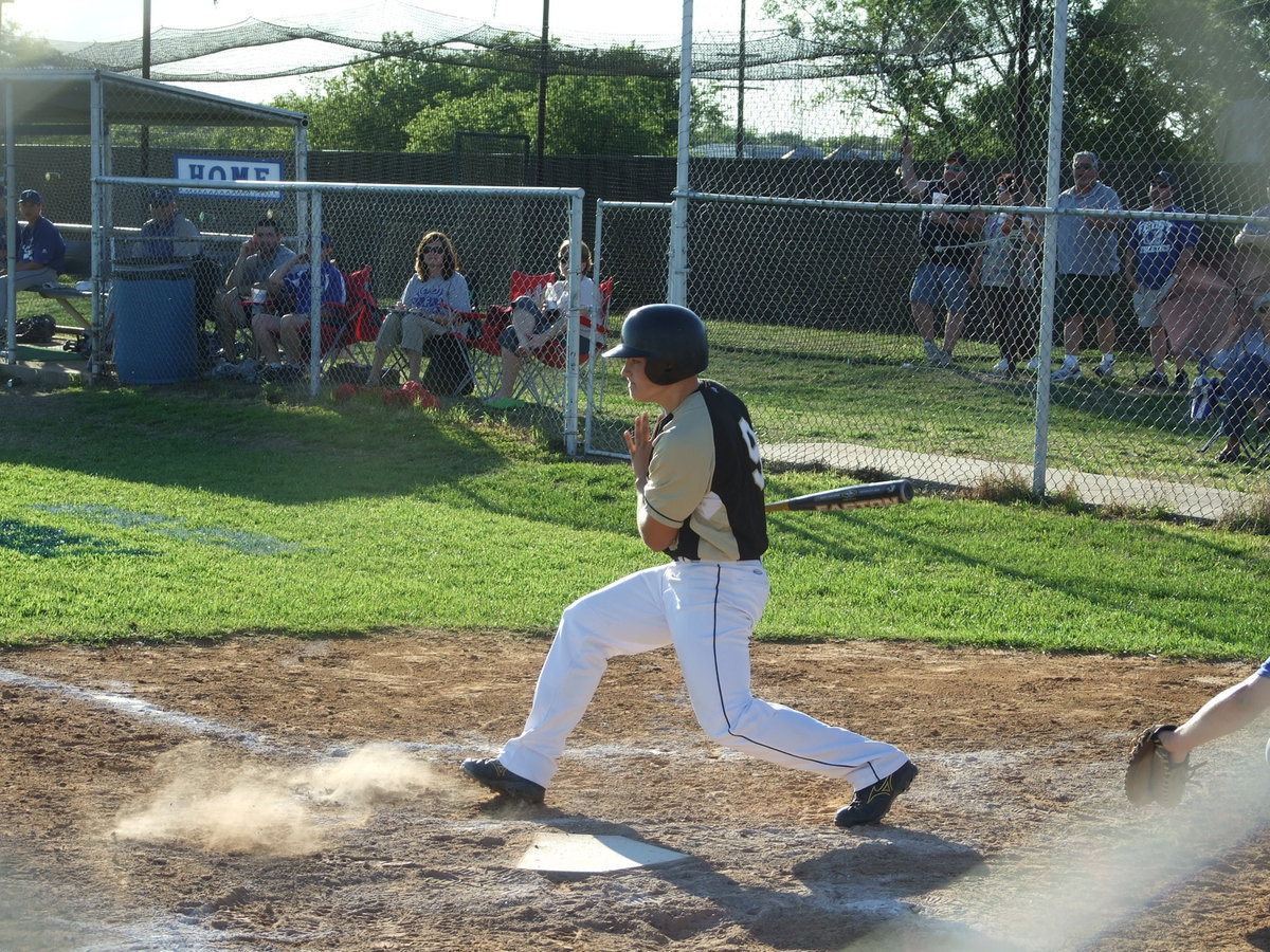 Image: Simon scores  — Ethan Simon hits a line drive to bring in another score.