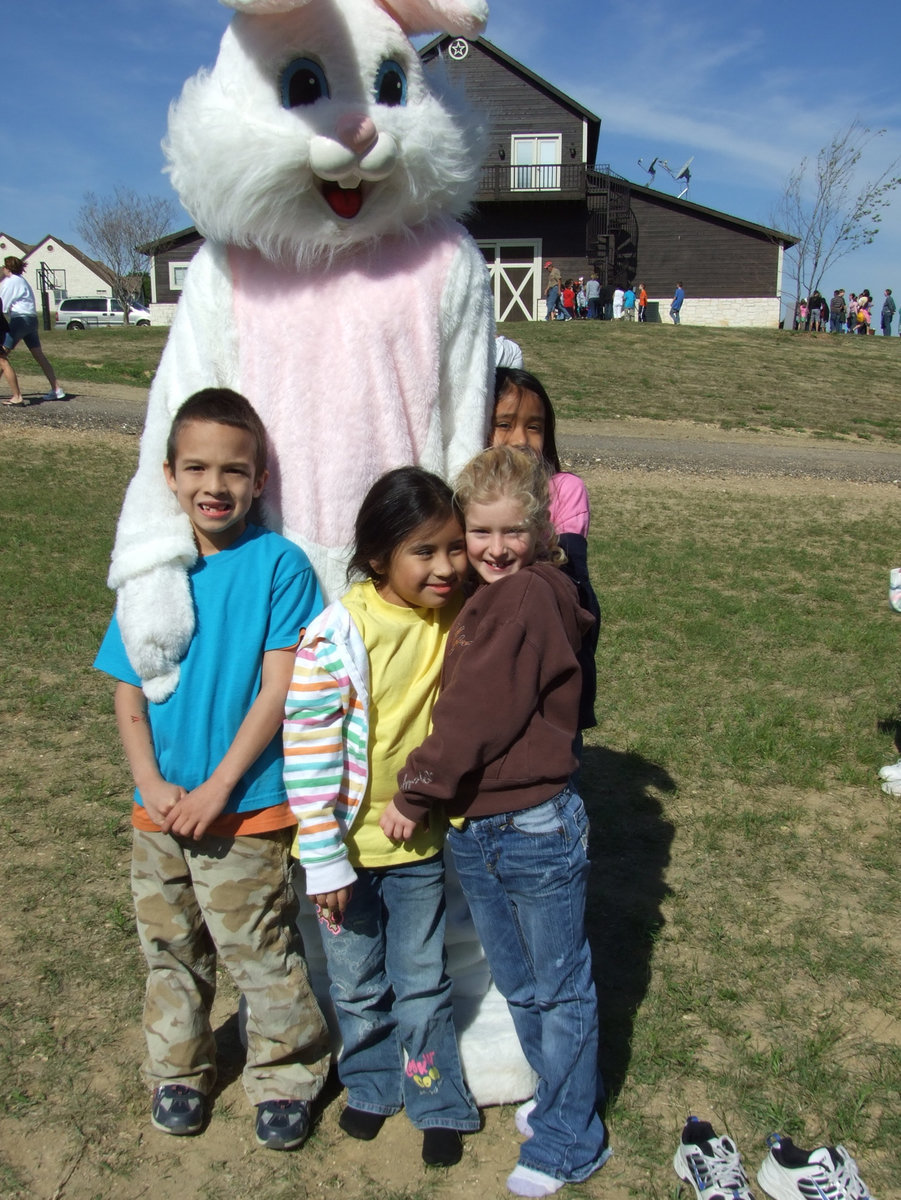 Image: Easter Bunny at the Haights — Four happy kids with the Easter Bunny.