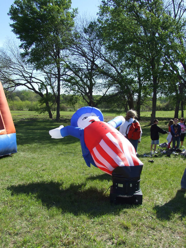 Image: High Winds — The wind almost knocked him down.