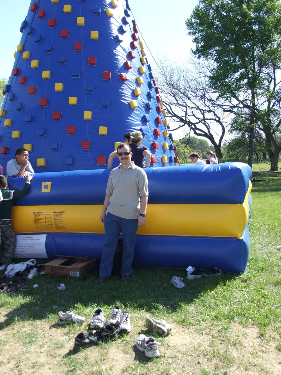 Image: Rock Wall — Jonathan McLean, watching the students having fun, took time out to let me take his picture.