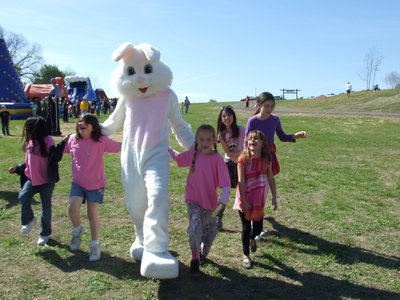 Image: Easter Bunny Fun — These happy students were having fun skipping with the Easter Bunny.