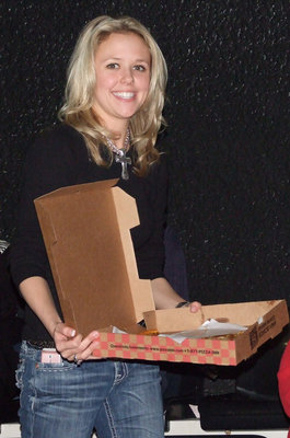 Image: Ashlyn Rossa wins — One of the spirit pizza winners shared with everyone around.