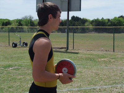 Image: Nash’s discus says it all — Jonathan Nash is ready to prove Italy can fly.