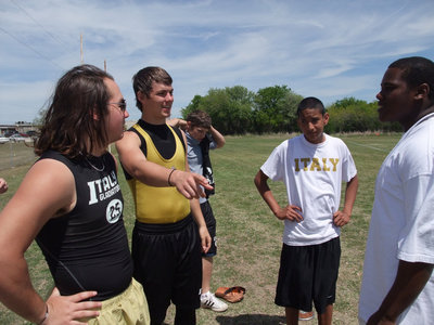 Image: Did you see that — Nash and Zach Hernandez and Eddie Garcia can’t believe how far Bobby Wilson’s discus flew.