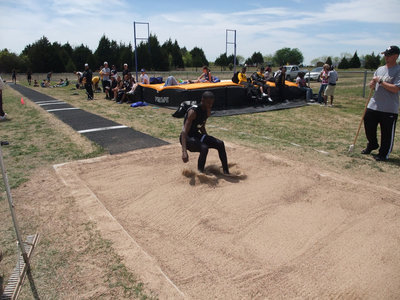 Image: John can fly — John Isaac just leaps past teammate Heath Clemons for 5th place to represent Italy in the triple jump at Area.