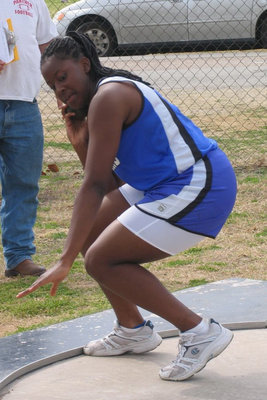 Image: The Shot — Ashley Ross preparing for her shot put throw.