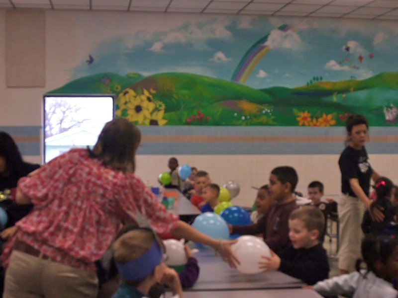 Image: Passing out balloons — Everyone was excited about the balloons.