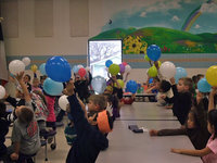 Image: Hold them up high — The students proudly displayed their balloons.