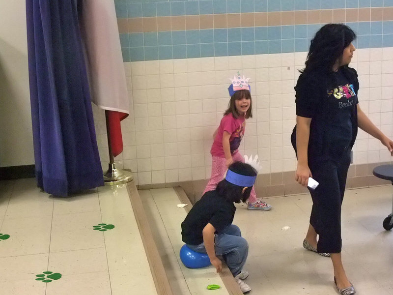 Image: Please pop — This balloon is a tough one, when this student couldn’t break the balloon by stomping on it, he decided to try sitting on it!