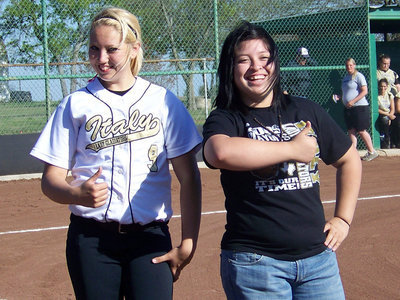 Image: Thumbs up — Megan and Blanca must be trying to thumb a ride for the Bulldogs to get out of town.