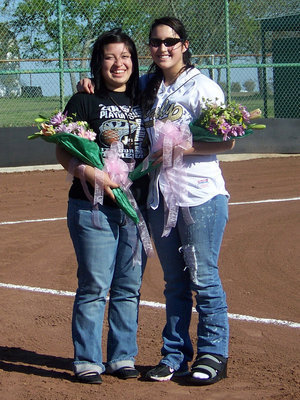 Image: Seniors — Manager Blanca Figueroa and injured center fielder Angelica Garza pose for memory shots.