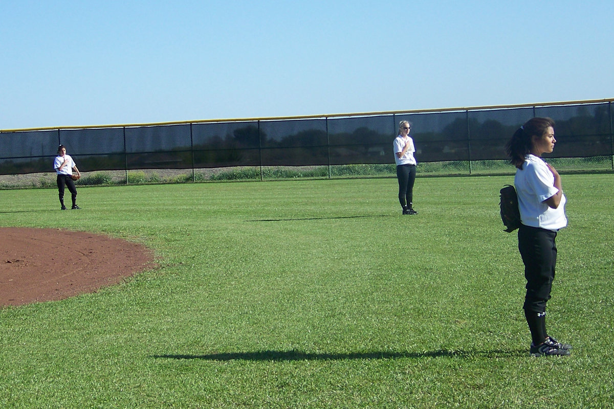 Image: Outfielders show respect