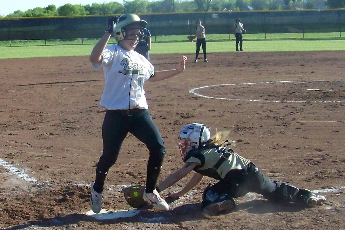 Image: Twinkle Toes — Courtney Westbrook squeaks in to score.