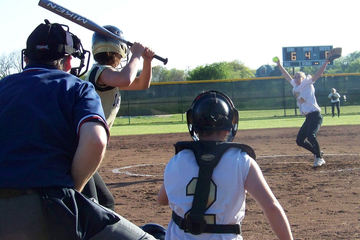 Image: The Delivery — Courtney strides out to deliver the pitch.