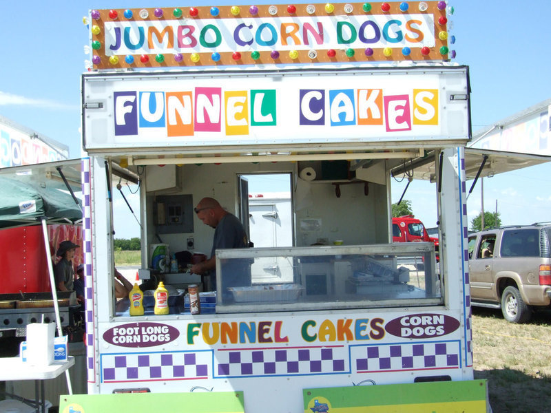 Image: Funnel Cake Anyone? — Lots of corn dogs and funnel cakes for sale.