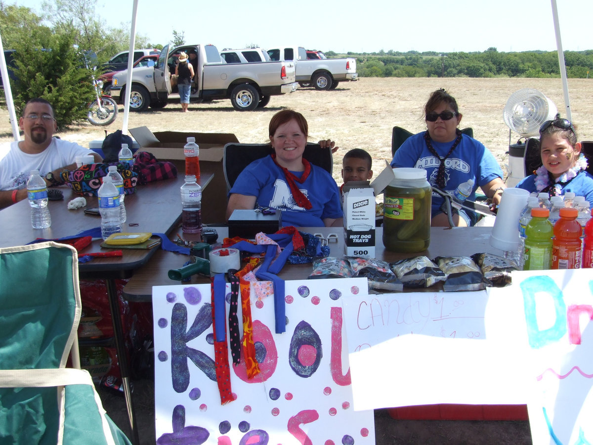 Image: Kool Ties — Tonya Krnavek is the junior high cheerleader sponsor. She said," We are selling Kool neckties the girls made this last week."