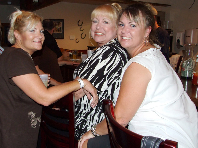 Image: Joe Kennerd’s Girls — Joe Kennerd is the owner of Miss Millie’s Restaurant and Music Hall. These are his two daughters and his wife in the middle.