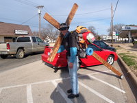 Image: Chuck Johns with his cross — Chuck has been across America twelve times since he started this mission in March of 2000.