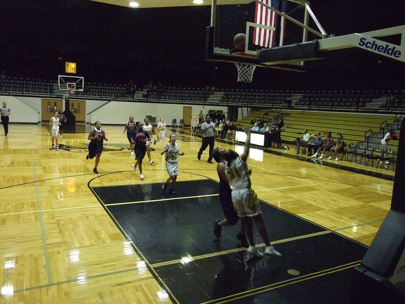 Image: Birdsong Pops The Cords — Chante lays the ball in the goal to finish the break.