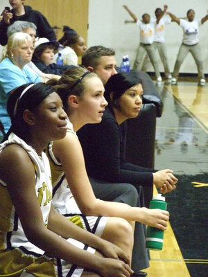 Image: Eyeing The Action  — The Italy Lady Gladiators (8th Girls) watch from the bench as they take a break from the action against Hampton.