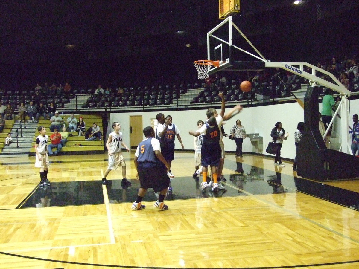 Image: Hopkins gets Hacked — Cole Hopkins gets hacked by a Hampton defender.