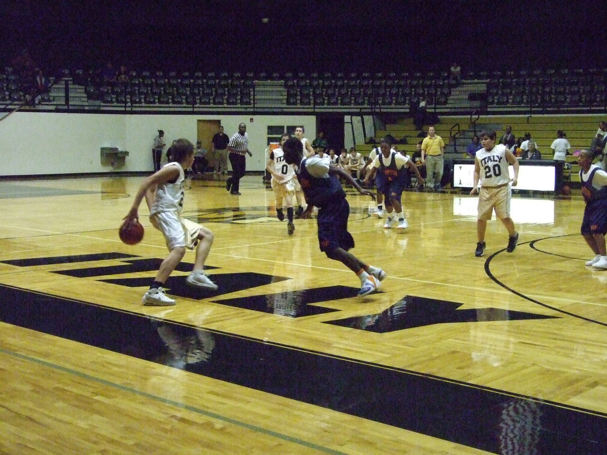 Image: Behind The Back — Cole plays keep-away from a Hampton player.