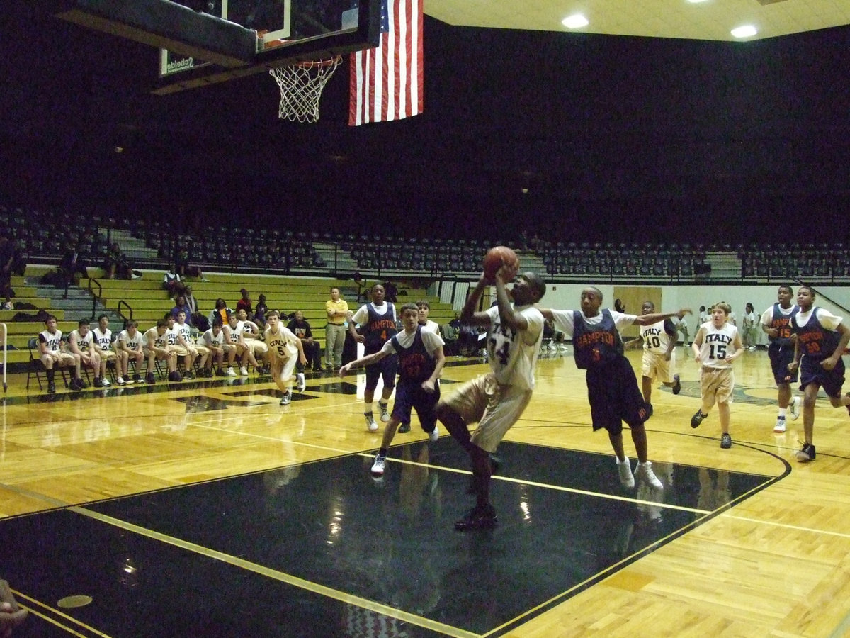 Image: Harris Attacks — Italy’s #34 Paul Harris goes up for 2-points as a Phoenix player flies after him.