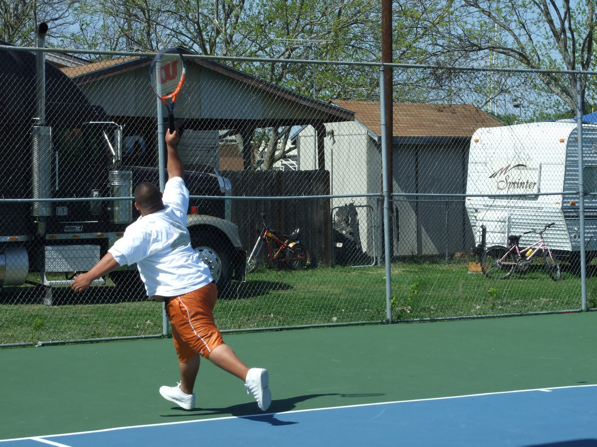 Image: Showing the abilities — “Cisco” shows off his no look, over the shoulder and back hand shot.