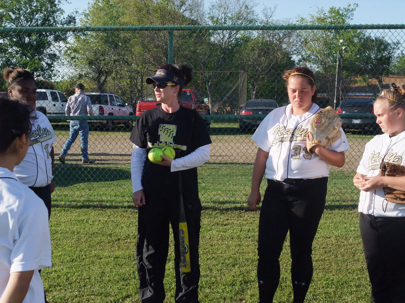 Image: Coach Andrea Windham — Coach Andrea Windham helps prepare the team for possible situations that may “pop” up during the game.