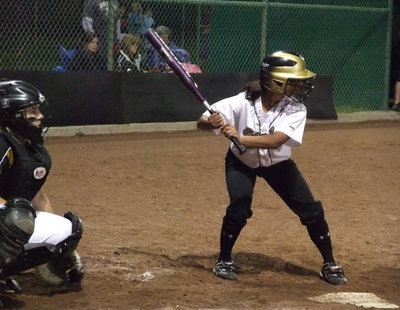 Image: Perez dispenser — Mariesela Perez tries to dispense some trouble to the Lady Jaguars. Italy won some battles but lost the war against Hubbard 9-0.