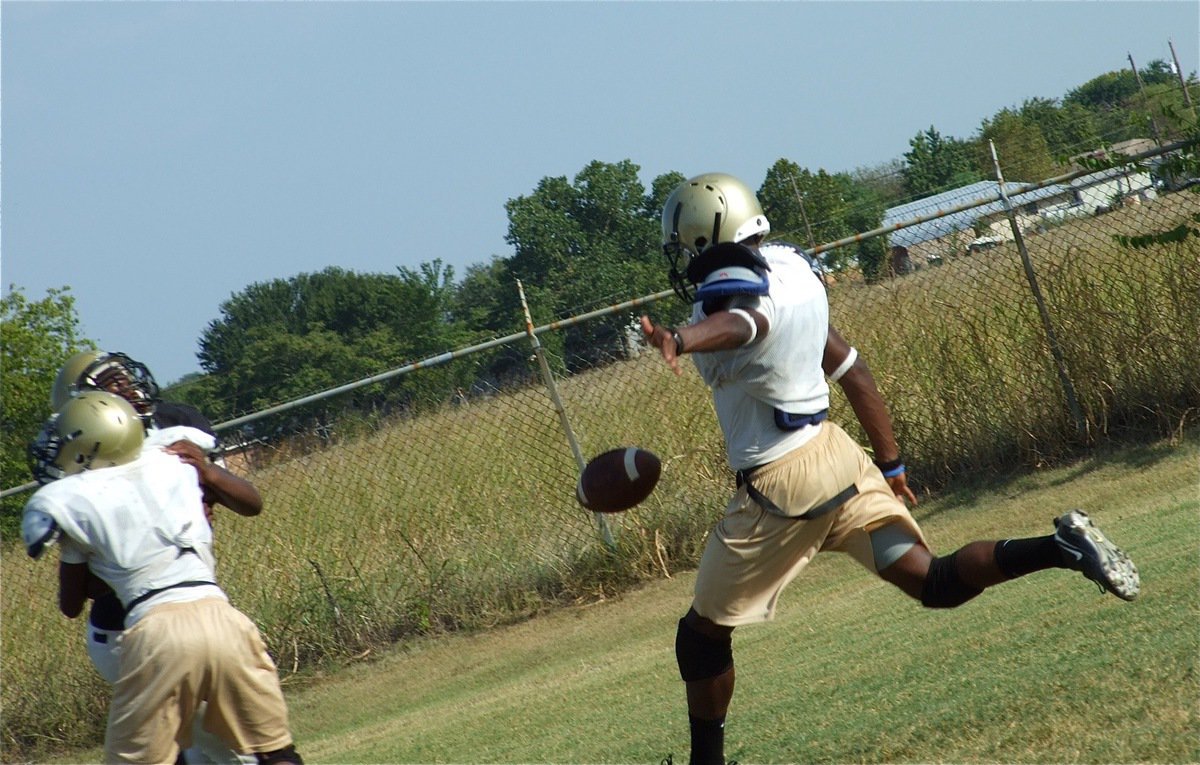 Image: Anderson punts — The Gladiators worked on special teams this week also.