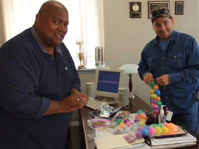 Image: Working Hard — Mayor Jackson and Jason Escamilla are busy stuffing plastic eggs with all kinds of goodies!