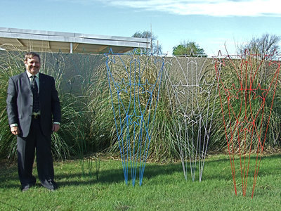 Image: Beautiful Star Trellises — Star trellises come in the stock colors of red, green, white, blue and black. John will make them in any color you would like if you needed a different color.