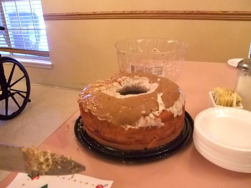 Image: Birthday Cake for All — Birthday cake, ice cream and punch was served up with a smile by Carolyn Powell (activities director).