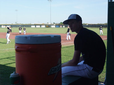 Image: Jase observes — Jase Holden can barely hold his breathe in anticipation of the game against Grand Prairie.
