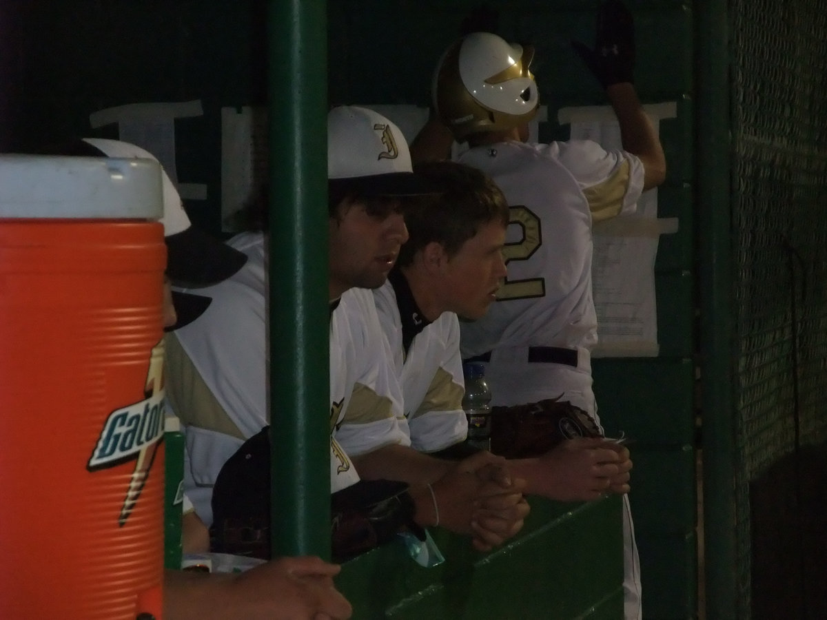 Image: The dugout is into it — The tension mounts as Italy tries to pull out of the the 10 run victory against Grand Prairie.