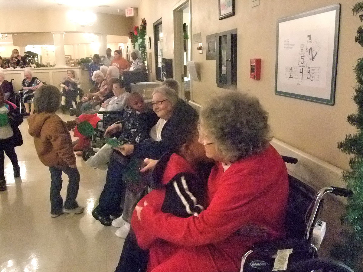 Image: Hugs and Gifts — The residents were in their glory with all the hugs.