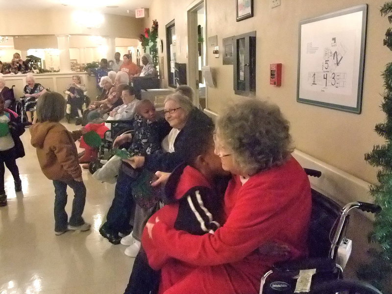 Image: Hugs and Gifts — The residents were in their glory with all the hugs.