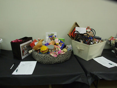 Image: “Dog” and “Western” Baskets — The “Dog” basket was donated by the second grade and sold for $70.00. The “Western” basket was donated by the third grade and it sold for $50.00